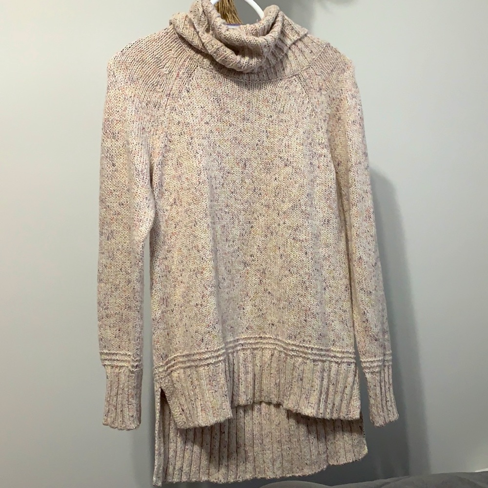 Turtleneck sweater.